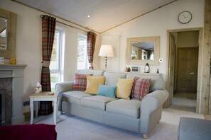 Cabin | Living area | Fireplace - 6 Berth Luxury Lodge in Christchurch, Dorset (Christchurch)