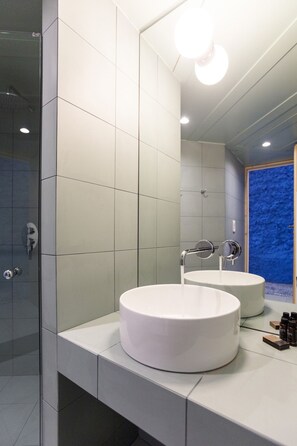 Bathtub, hair dryer, towels, soap
