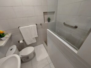 Shower, hair dryer, towels, soap