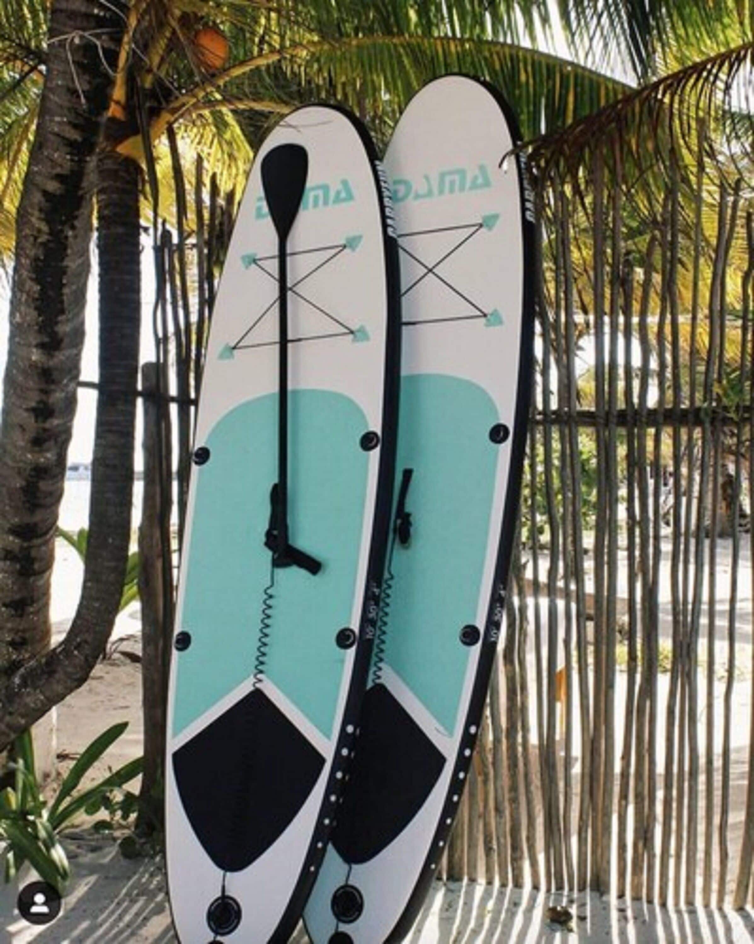 on the beach, white sand, beach towels, beach massages