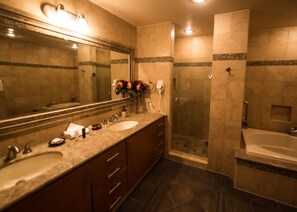 Bathtub, hair dryer, towels, soap