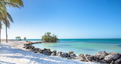 Adventures in Paradise at Sombrero Beach ~ Pet friendly waterfront pool home, 26' dock