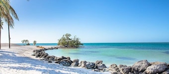 Adventures in Paradise at Sombrero Beach ~ Pet friendly waterfront pool home, 26' dock