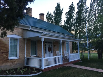 Cute pioneer brick house in the country 