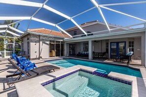 Outdoor pool, a heated pool - Lovely 2 story Spanish Colonial with pool and spa (Marco Island)