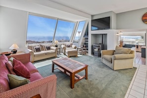 Living room with spectacular ocean views from Point Reys to Bodega head