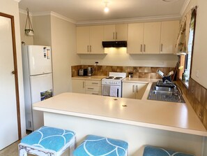 Fridge, oven, electric kettle, toaster