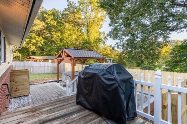 Enjoy outdoor cooking on the deck with a barbecue grill and take in the serene surroundings.