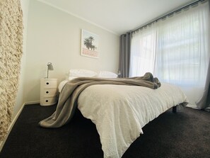 2 bedrooms, blackout curtains, iron/ironing board, travel cot
