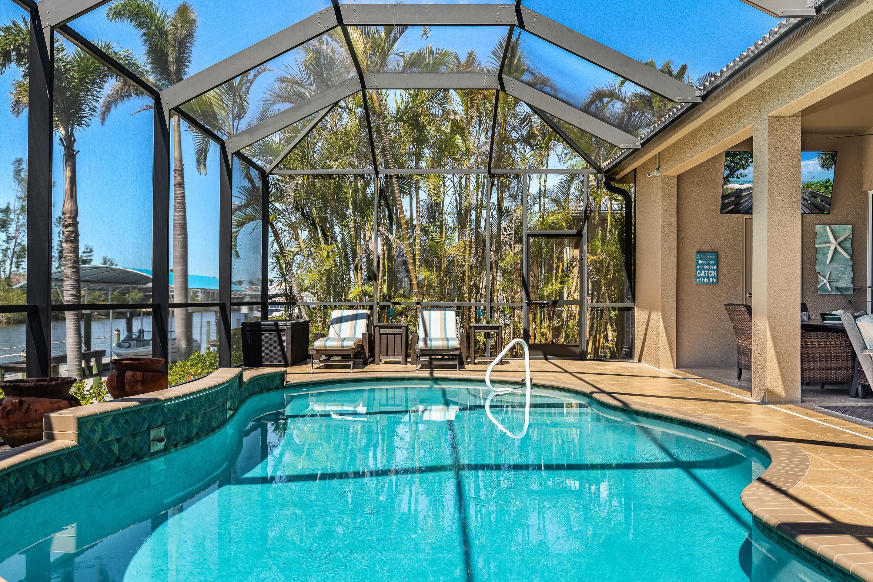 BRAND NEW with heated Pool & Dock with Tiki - Villa Neptune's Grotto - Roelens Vacations