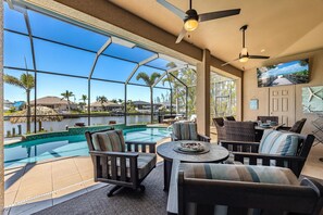 A heated pool, pool loungers