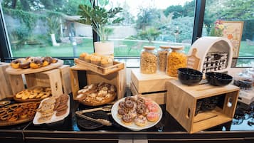 Daily buffet breakfast (EUR 24 per person)