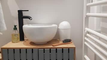 Hair dryer, towels, soap, toilet paper