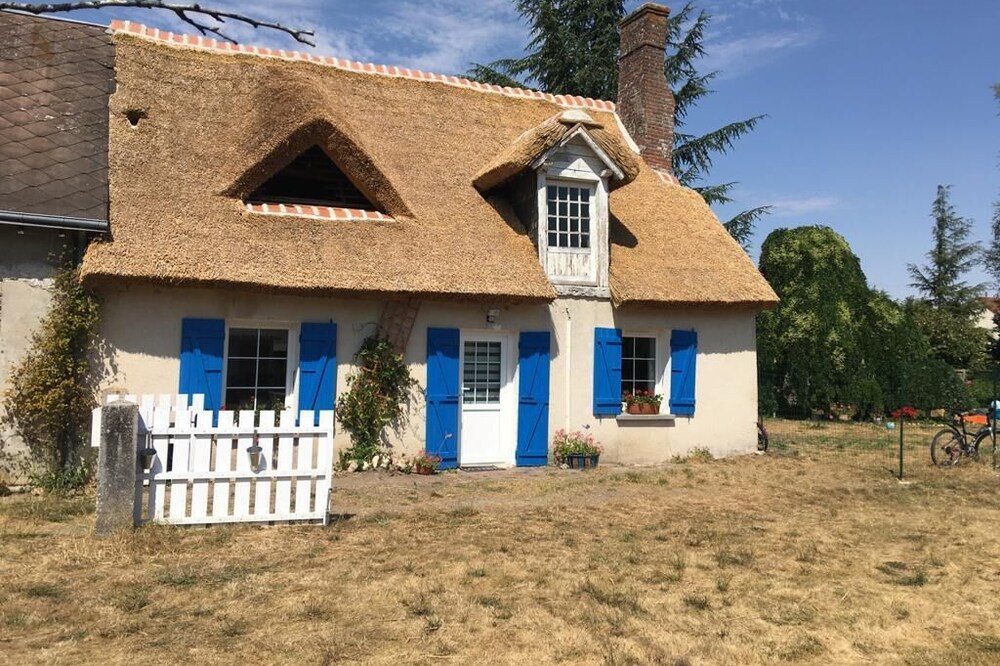 Rustic thatched cottage