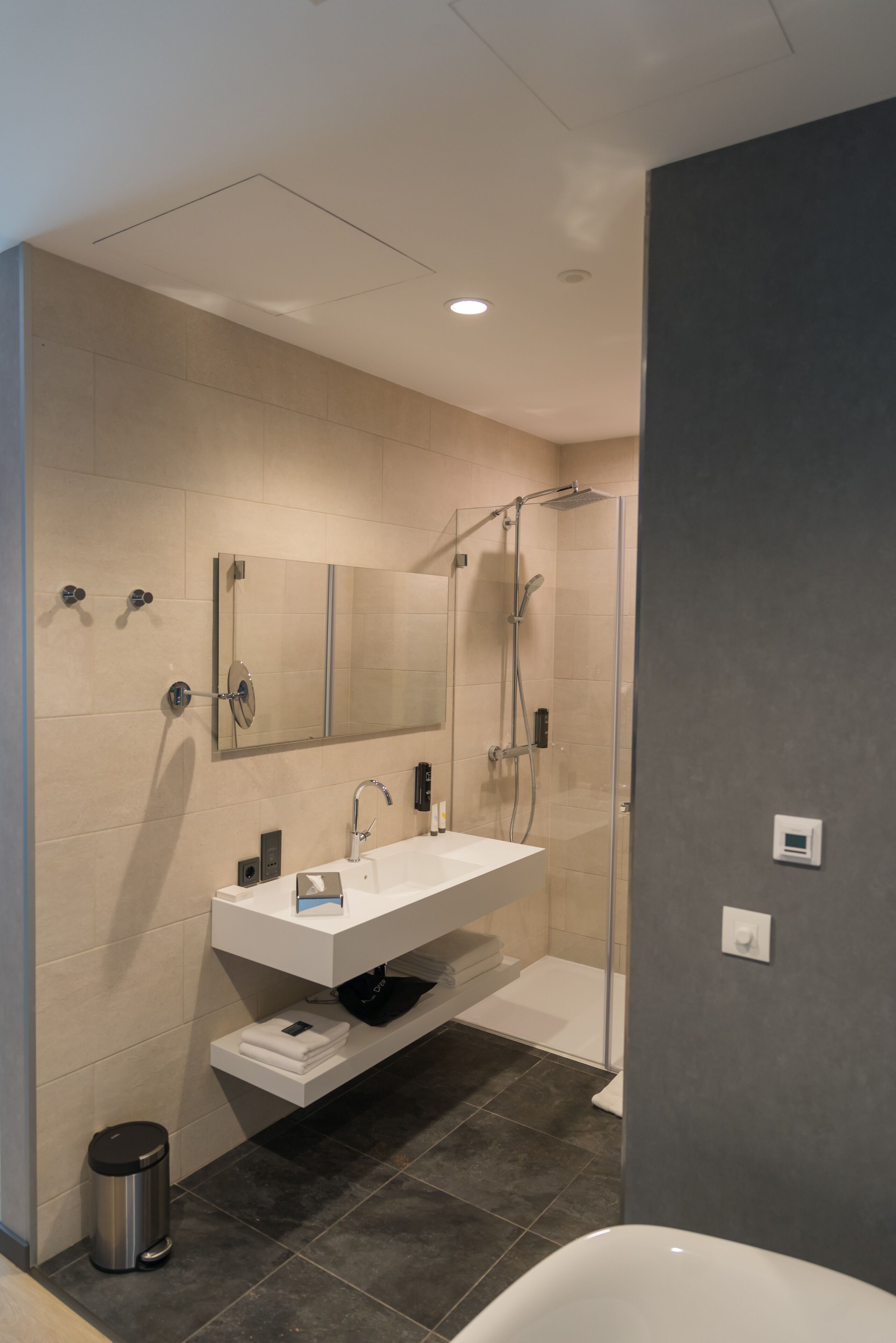 free toiletries, hair dryer, heated floors, towels