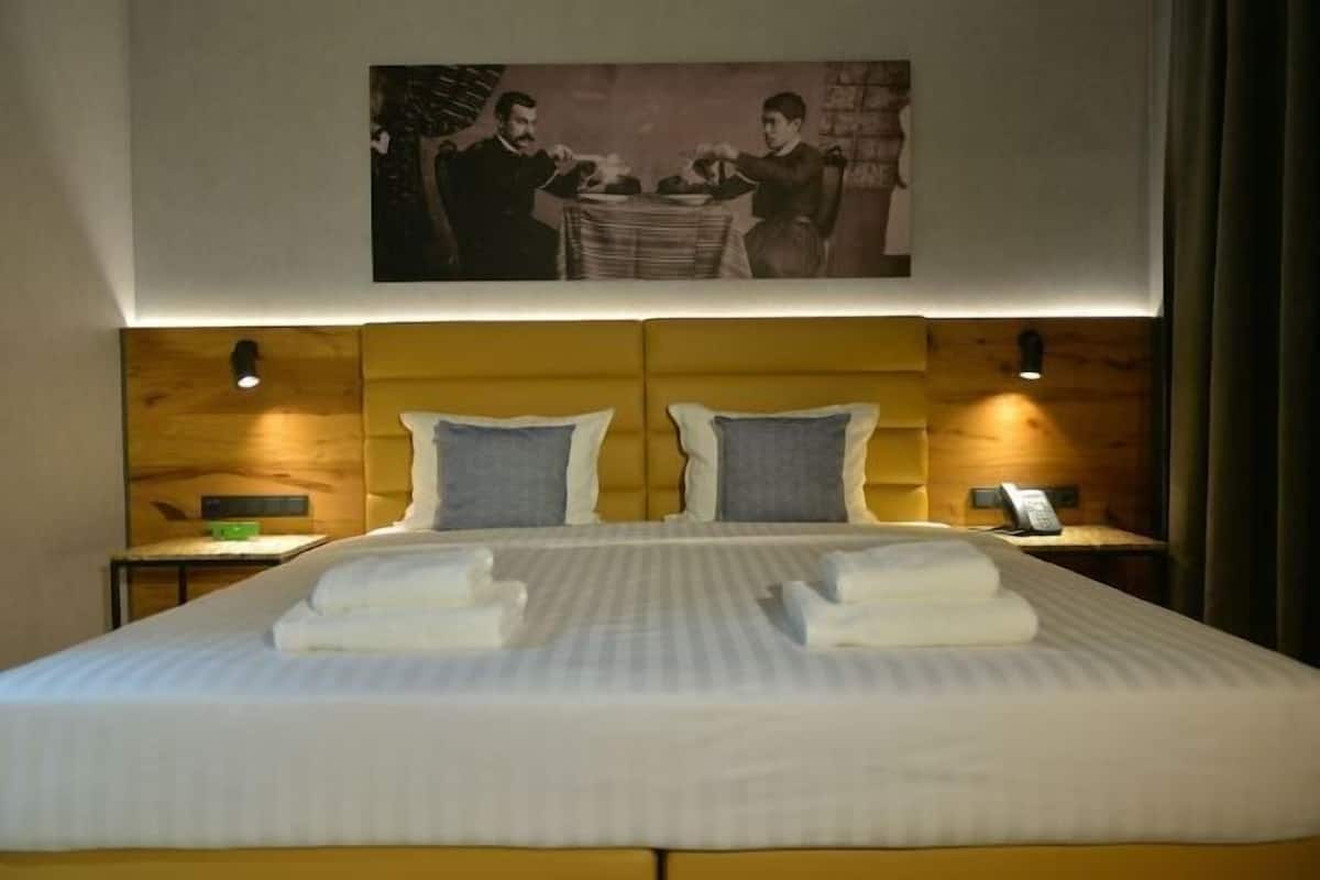 1 habitación, ropa de cama hipoalergénica y minibar