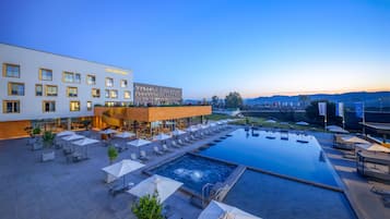 Outdoor pool, open 7:00 AM to 7:00 PM, pool umbrellas, sun loungers