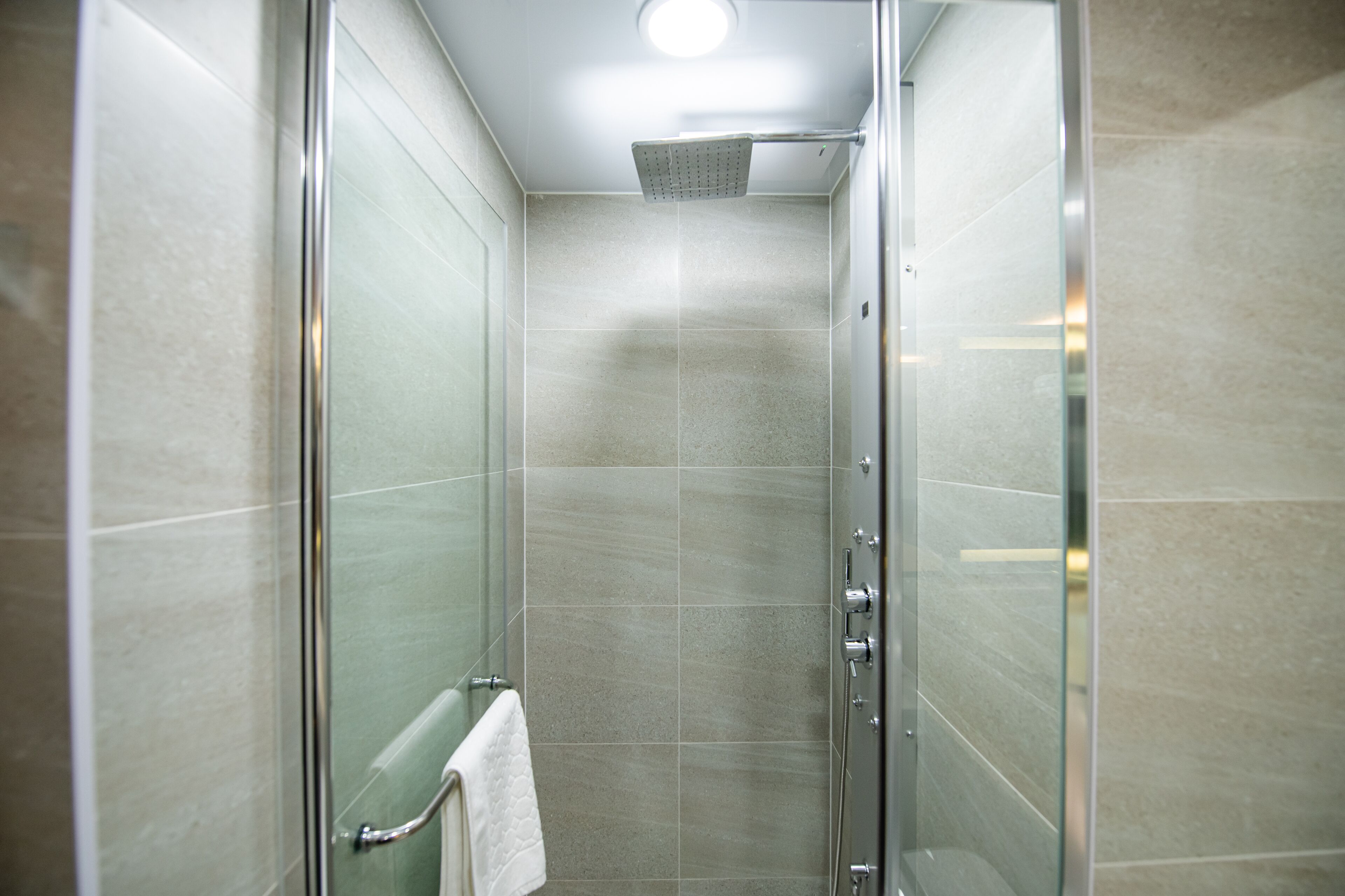 shower, hair dryer, dressing gowns, slippers