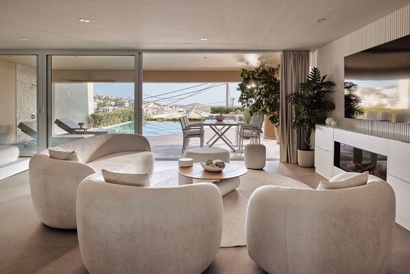 Deluxe Studio - Lottus | Coin séjour | TV connectée de 48 pouces avec chaînes par câble, télévision, Netflix