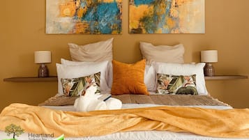 1 habitación, tabla de planchar con plancha y ropa de cama