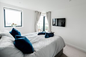 Apartemen, 2 kamar tidur, patio, pemandangan kebun | 2 kamar tidur dan tempat tidur bayi