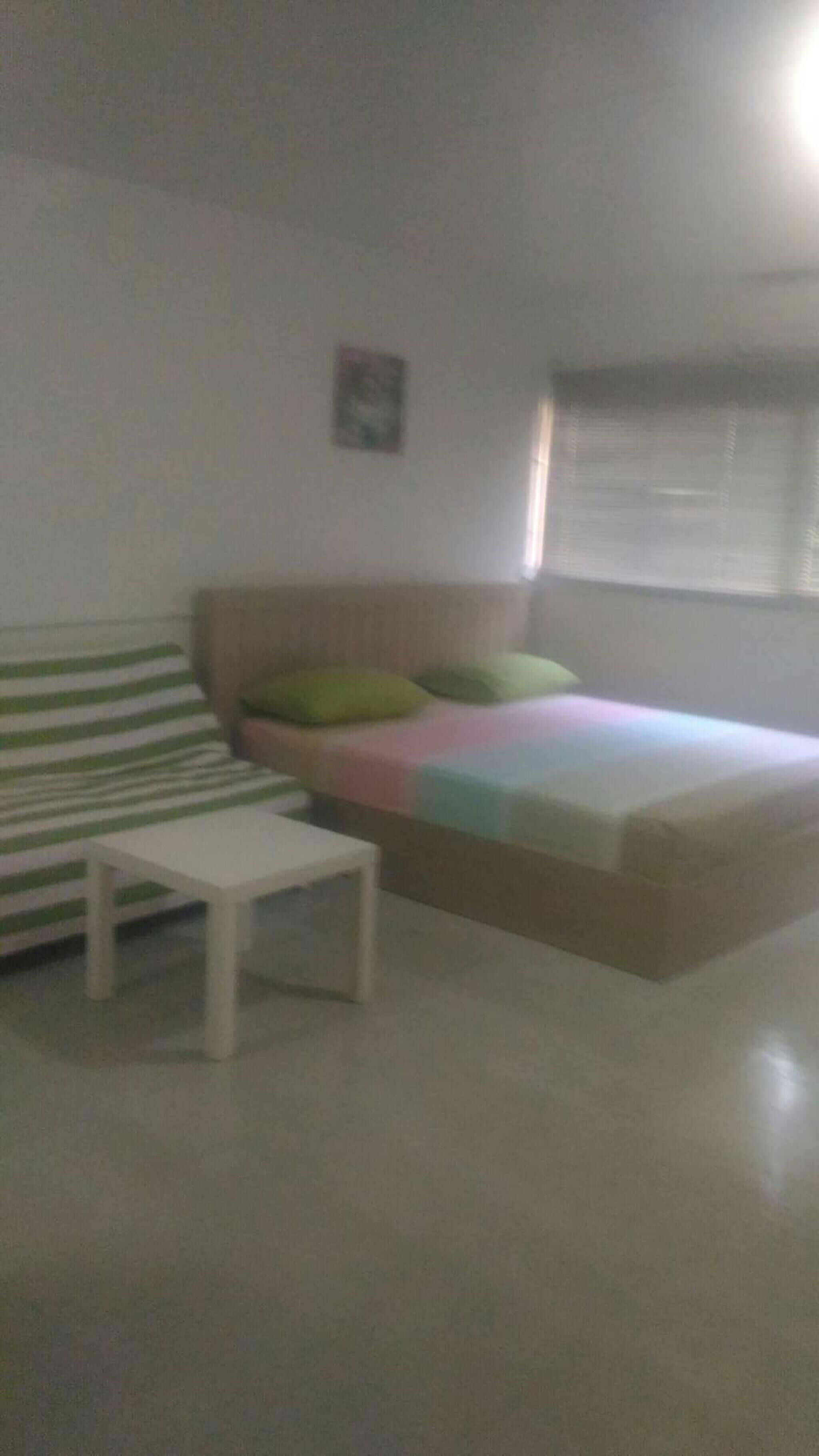 Habitación, 2 habitaciones, vista a la ciudad | Área de sala de estar