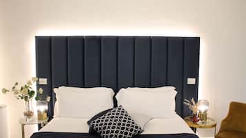 Suite, 1 Bedroom (Zaffiro) | 2 bedrooms, individually decorated, individually furnished