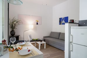 Appartement, 1 chambre | Aire de séjour