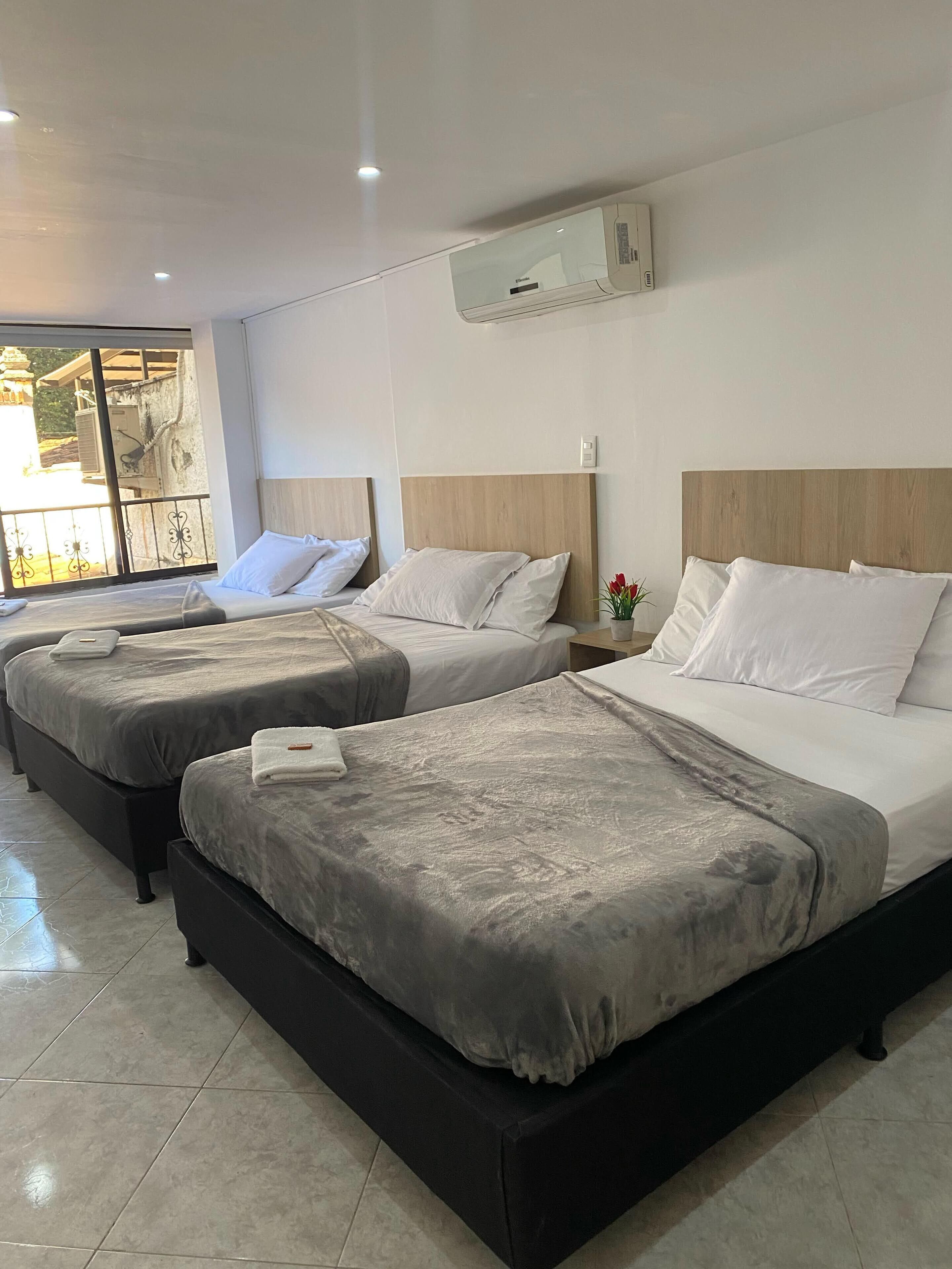 Family Room, Multiple Beds, Air conditioning | Desk, free WiFi, bed sheets