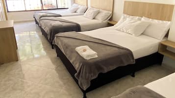Family Room, Multiple Beds, Air conditioning | Desk, free WiFi, bed sheets
