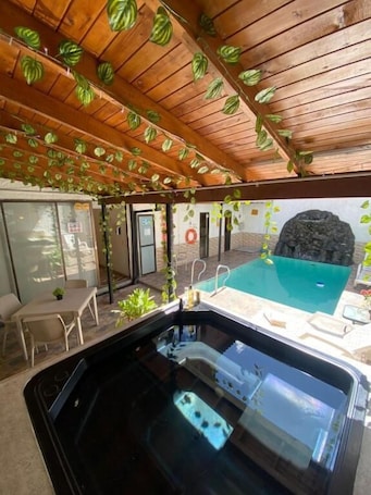 Outdoor pool. HOTEL COLORES BOUTIQUE