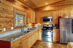 Fridge, microwave, oven, stovetop - Snug Harbor Resort and Marina - Two Bedroom Waterfront Suite (Friday Harbor)