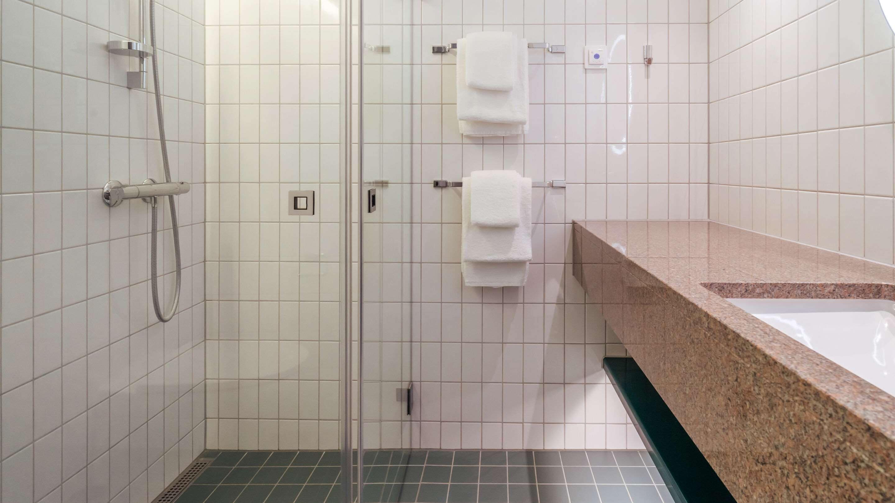 free toiletries, hair dryer, heated floors, towels