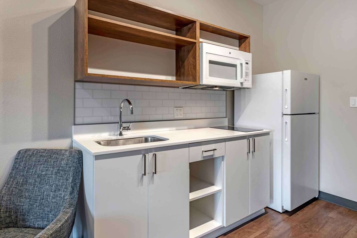 premium bedding, desk, laptop workspace, iron/ironing board