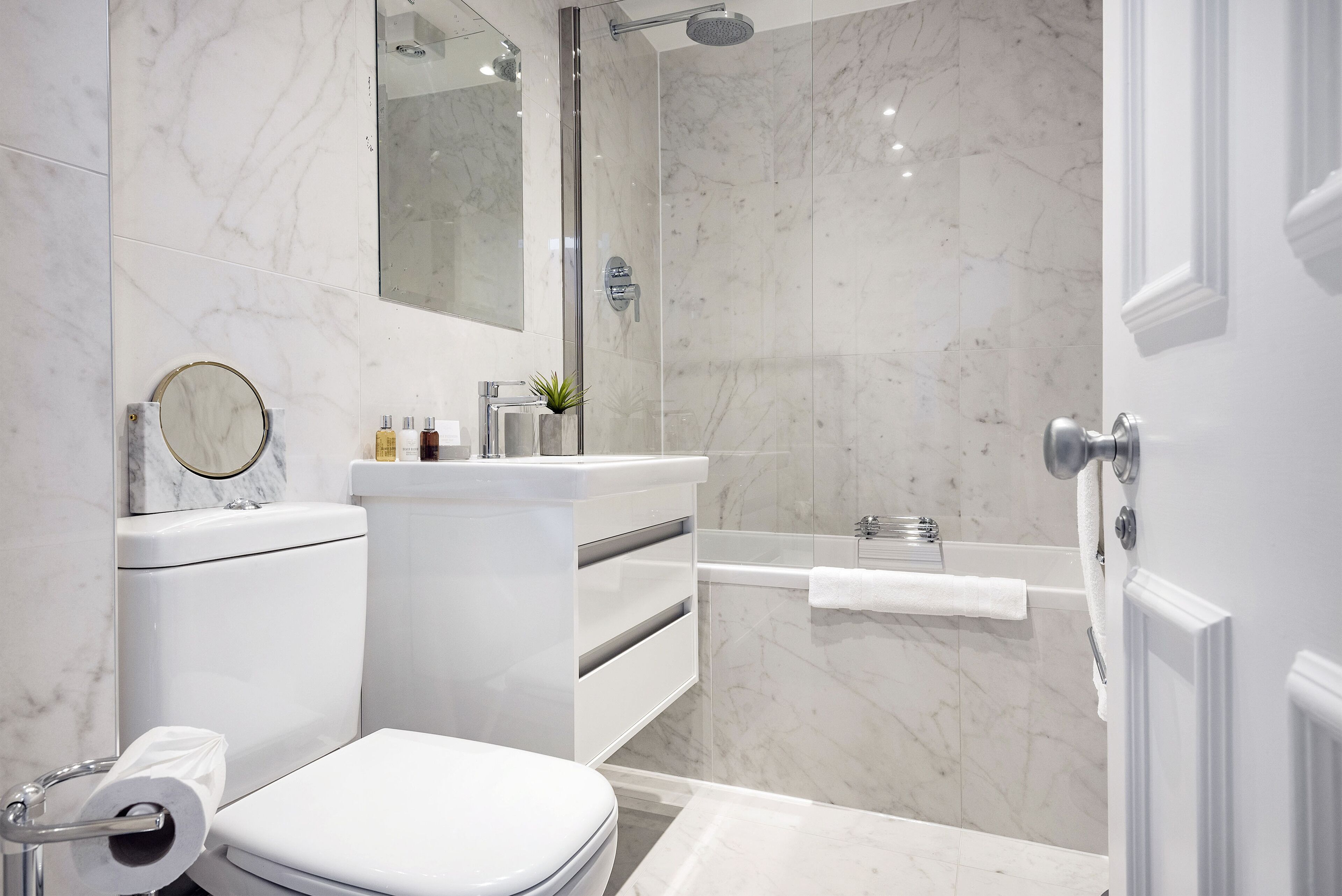 Combined shower/tub, hair dryer, towels, soap