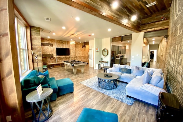 From the wood accent ceiling to the warm lighting, you love this cozy space!
