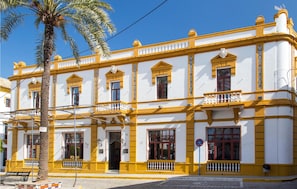 Classic building with a central entrance and symmetrical facade.
