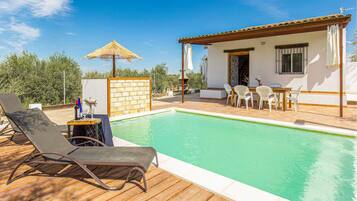 Relax by the pool, dine al fresco, or unwind in a shaded seating area.