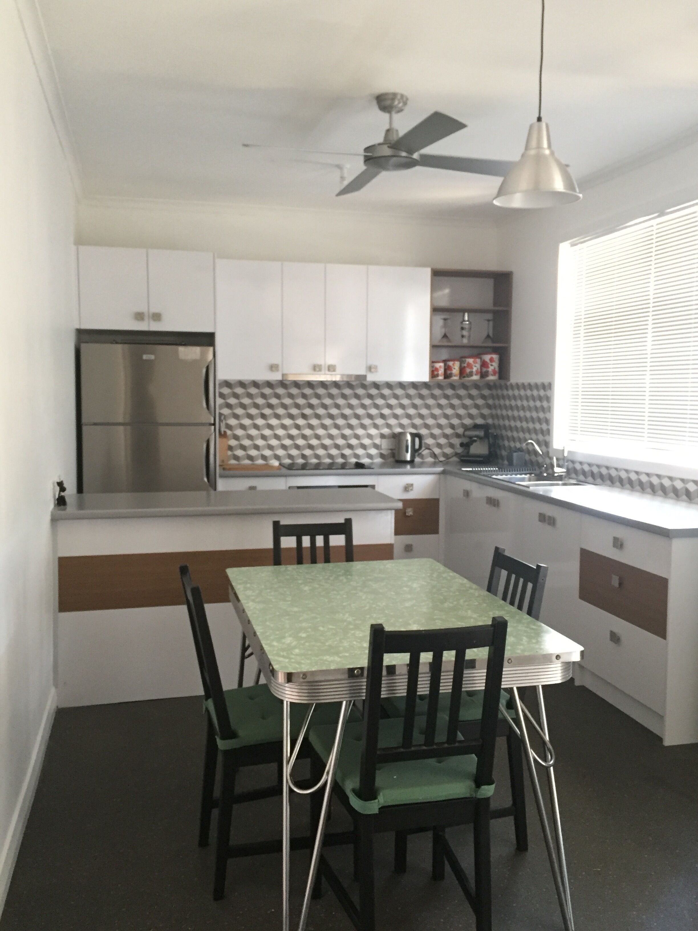  A Modern/Retro styled home with a fun black Cat theme. 