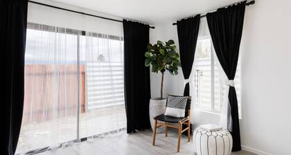 Striking Black & White Apt w Gated Entrance & Yard