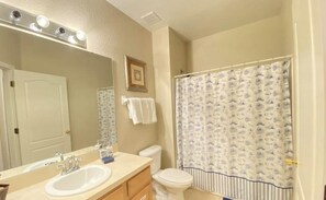 Combined shower/bathtub, hair dryer, towels, soap