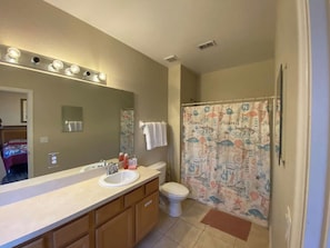 Combined shower/tub, hair dryer, towels, soap