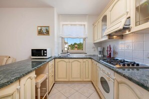 Apartamento (A1) | Cozinha privada