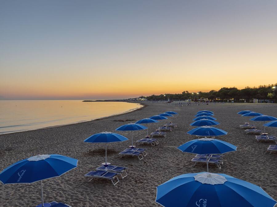 On the beach, free beach cabanas, beach umbrellas, beach towels