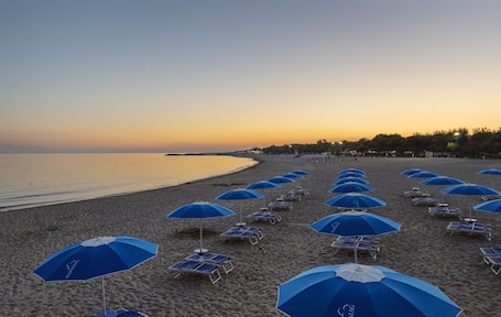 On the beach, free beach cabanas, beach umbrellas, beach towels. Hapimag Resort Cavallino