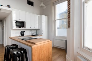 Apartment | Private kitchen | Fridge, microwave, oven, stovetop - Immaculate 1-bed Apartment on Hove Seafront (Hove)