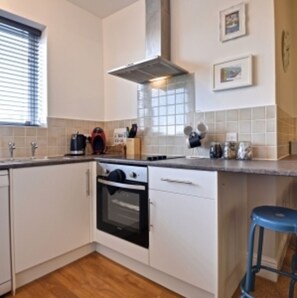 Apartment, Multiple Beds | Private kitchen
