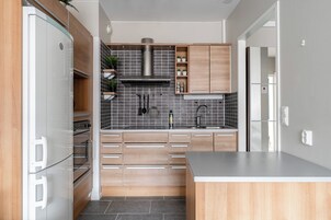 City Apartment | Private kitchen | Oven, stovetop, dishwasher, coffee/tea maker