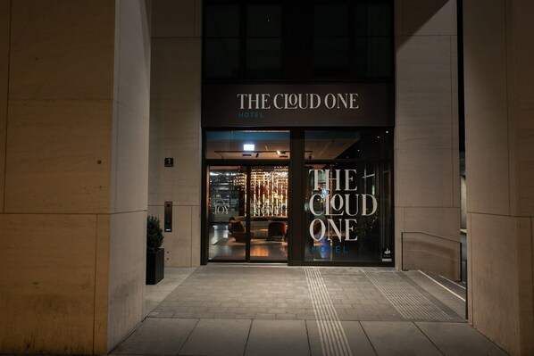 The entrance to The Cloud One Hotel with a modern facade and illuminated signage. - The Cloud One Nürnberg, part of the Motel One Group (Nuremberg)
