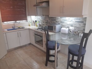 Fridge, microwave, stovetop, electric kettle